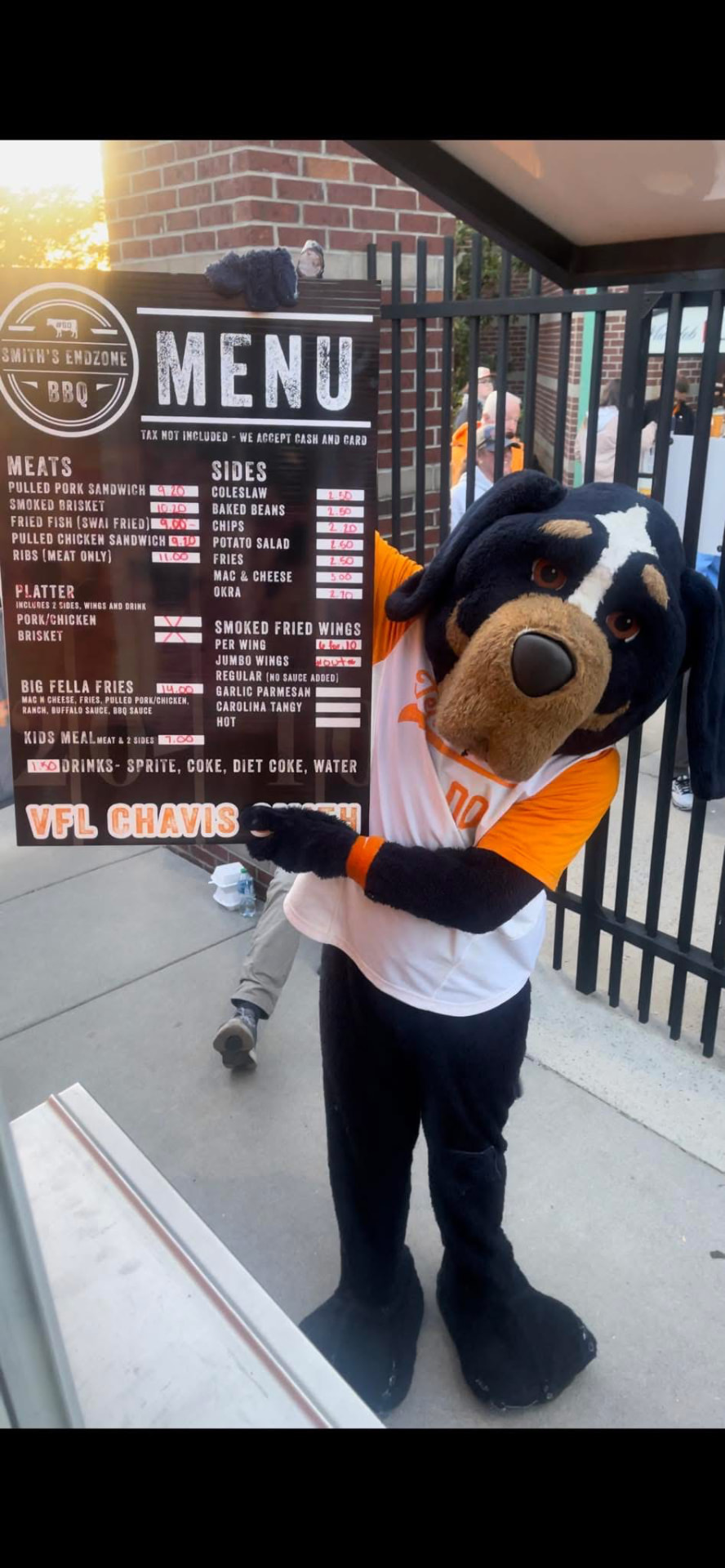 Smith's Endzone BBQ menu board with the Tennessee mascot