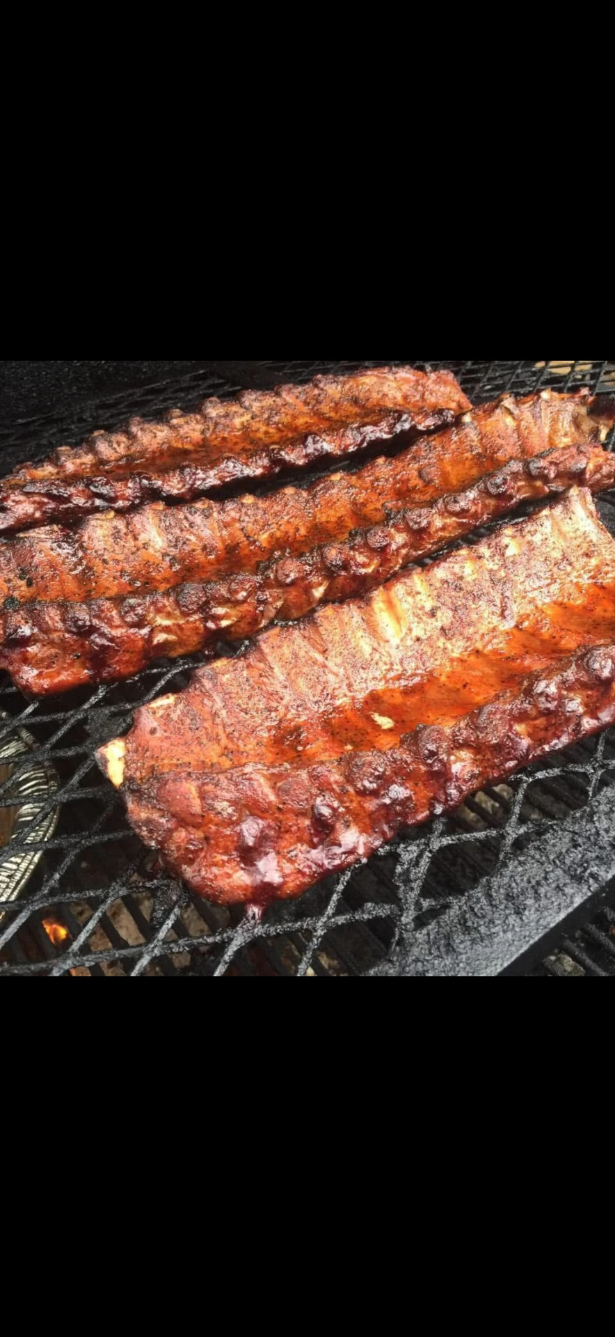 Racks of ribs on the grill